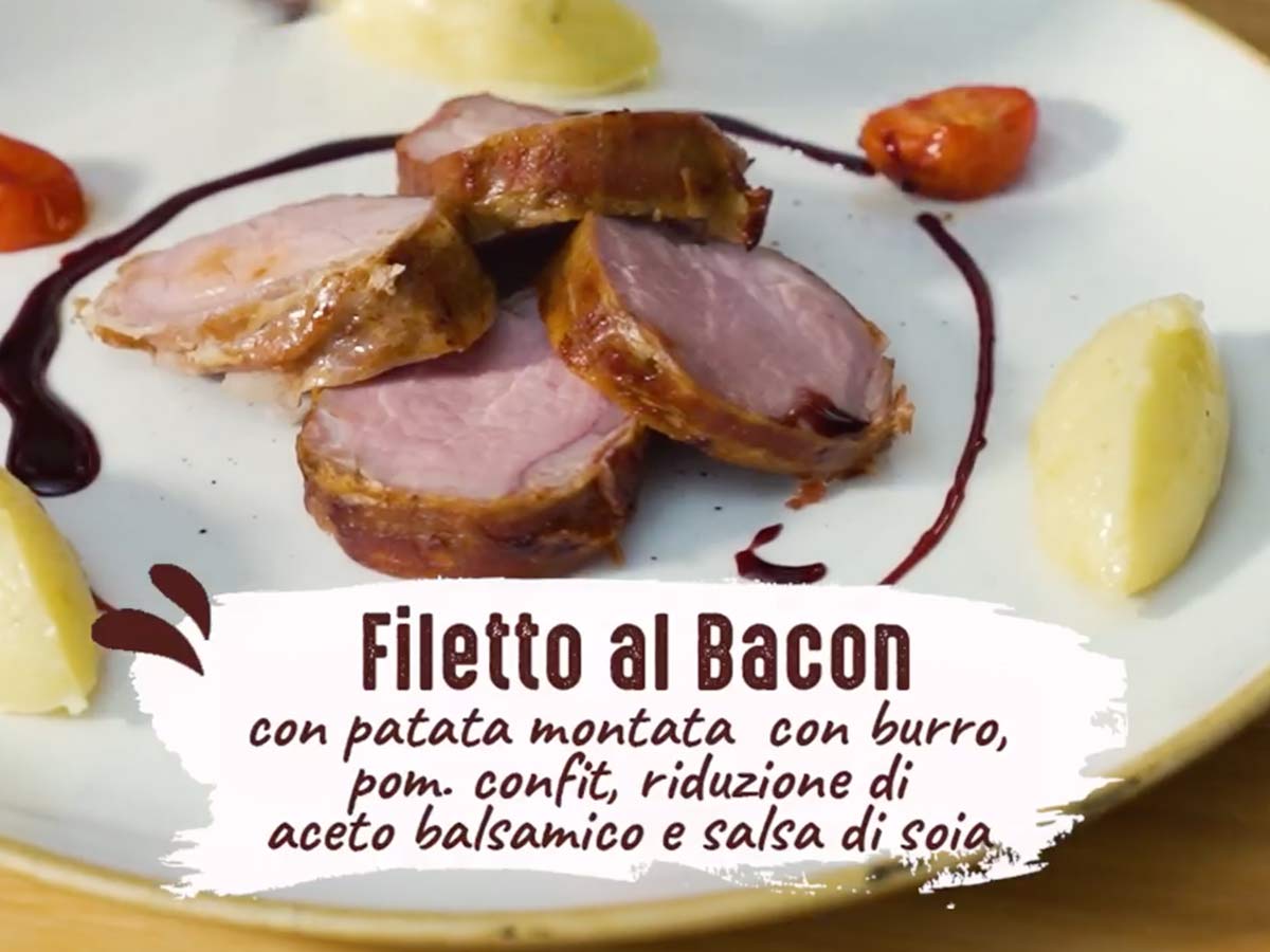 Filetto al Bacon con patata montata con burro, pomodorini confit e riduzione al balsamico